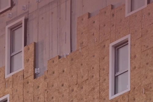 Instalación del sistema SATE para aislamiento térmico en una fachada de Madrid